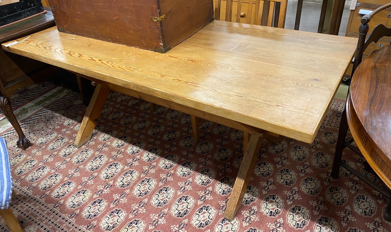 A rectangular pitch pine tavern type refectory dining table, length 182cm, width 86cm, height 73cm and four pitch pine dining chairs